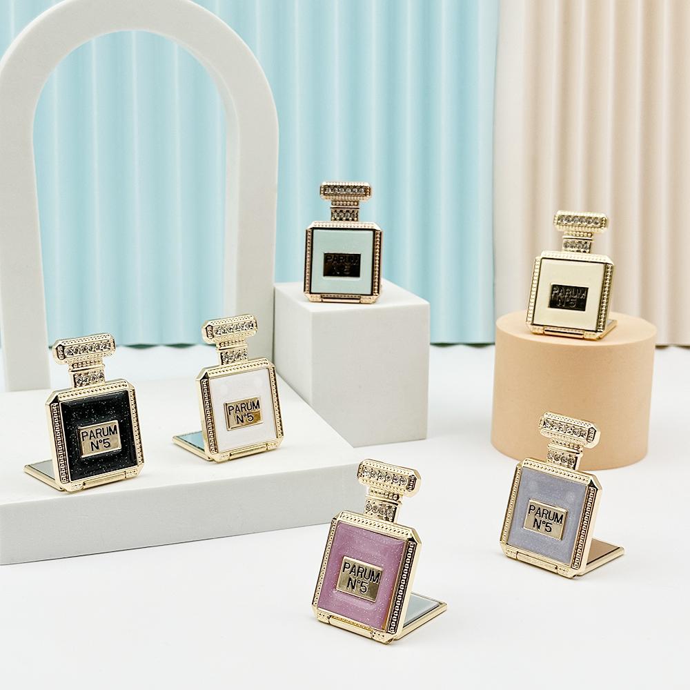 Étui de téléphone avec miroir et support pour bouteille de parfum