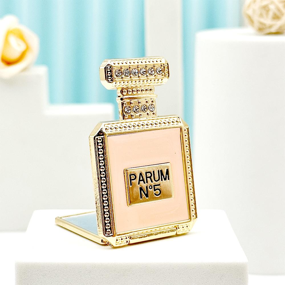 Étui de téléphone avec miroir et support pour bouteille de parfum