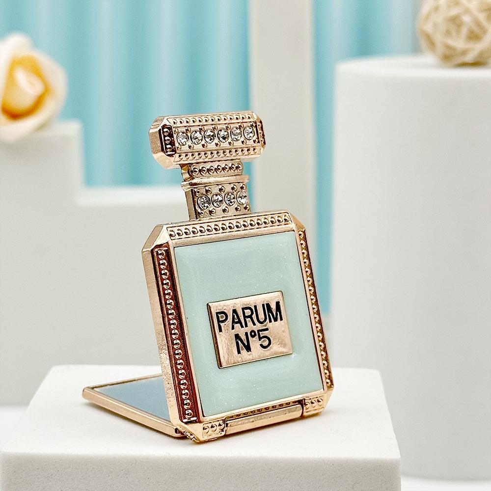 Étui de téléphone avec miroir et support pour bouteille de parfum