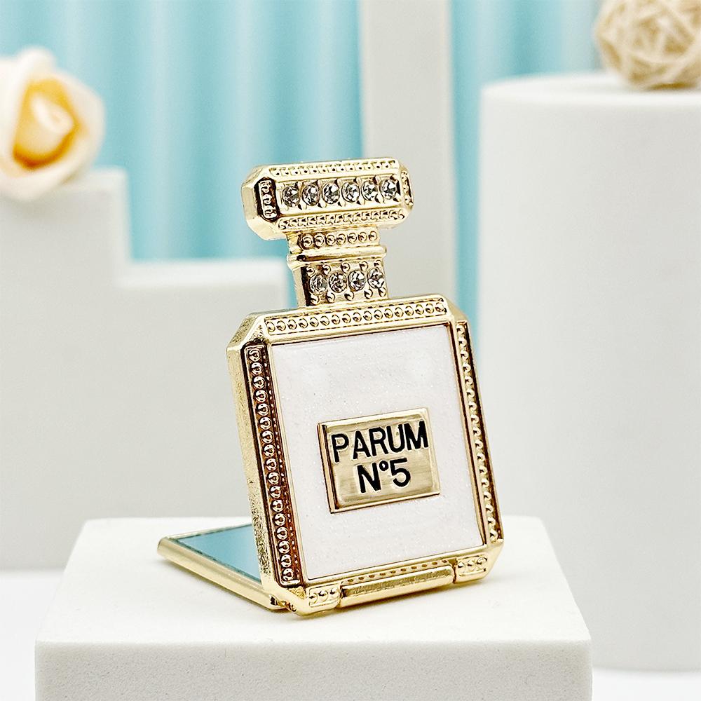 Étui de téléphone avec miroir et support pour bouteille de parfum
